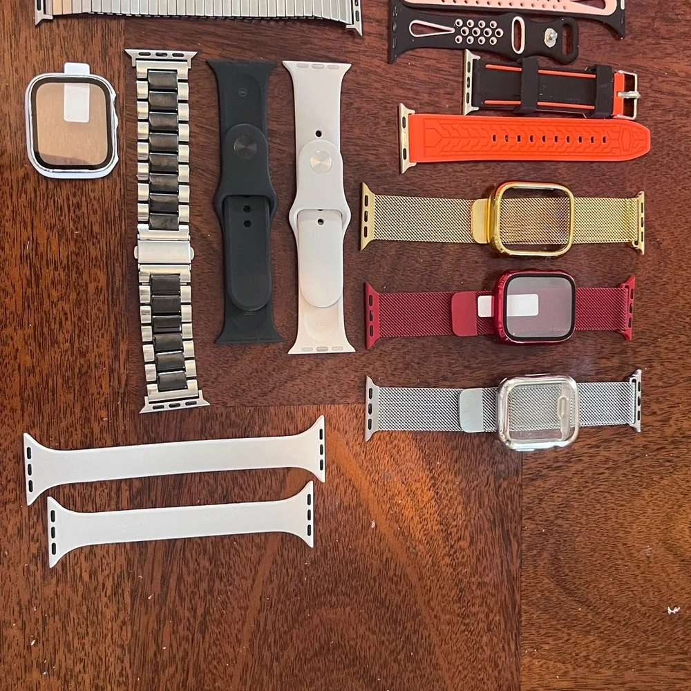 Apple Watch Series 8 w/band collection and cases.
